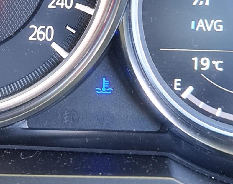 Decoding the Dashboard: What a Blue Light Under Your Speedometer Reveals About Your Car’s Smart Automation